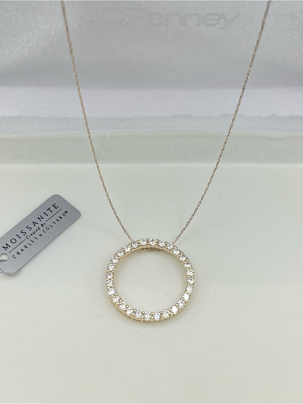 10k solid gold moissanite circle of life, eternity, pendant, and 10k chain 19”